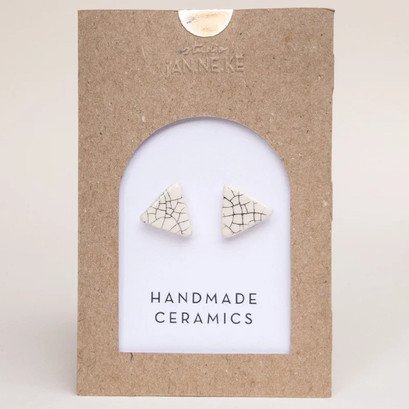 Crackle triangle studs by Janneke