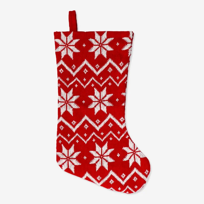 Knitted Christmas stocking with snowflakes